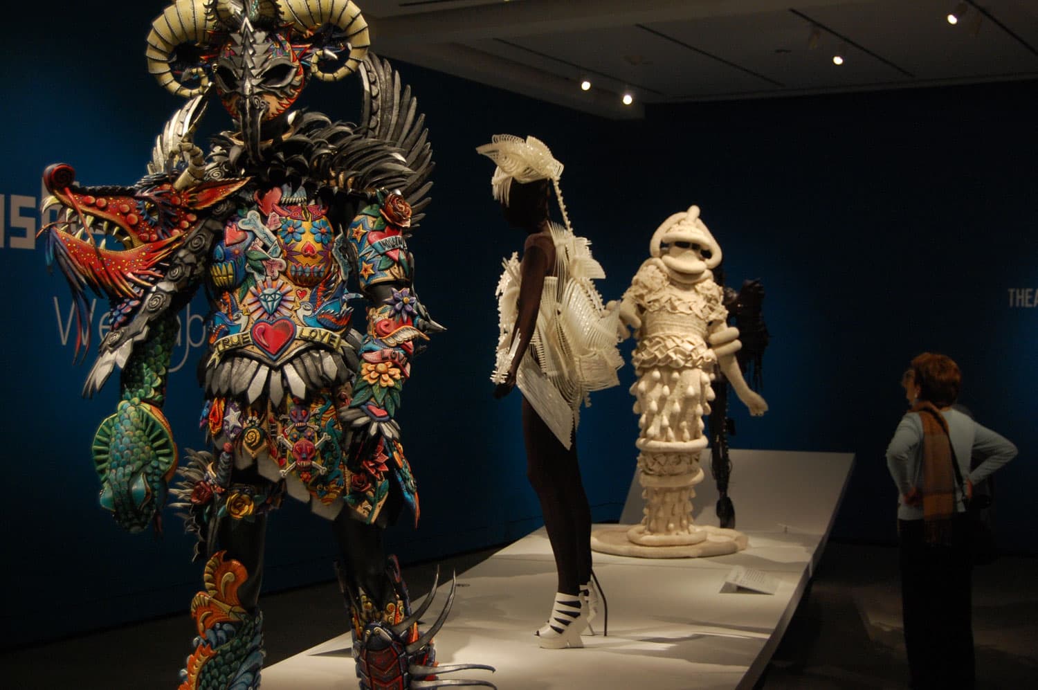 “Inkling” (at left) by Gillian Saunders at Peabody Essex Museum's exhibit of "WearableArt." (Greg Cook/WBUR)