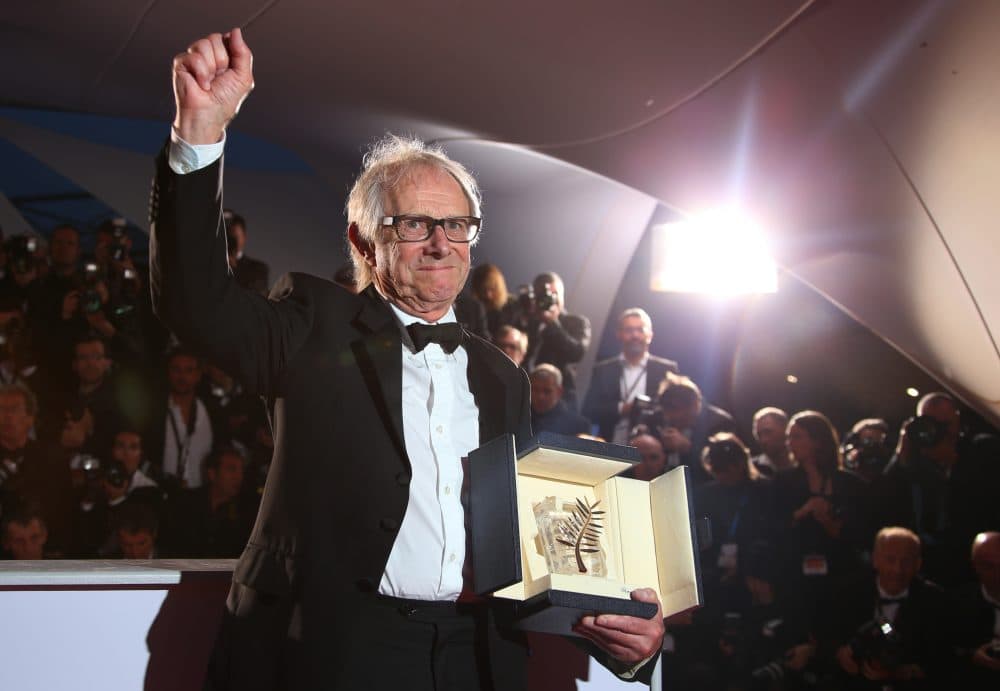 Director Ken Loach poses for photographers with the Palme d'Or for his film "I, Daniel Blake," following the Cannes Film Festival in 2016. (Joel Ryan/AP)