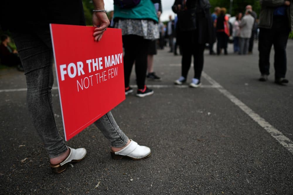 Supporters of Britain's main opposition Labour Party await the arrival of the party's leader, Jeremy Corbyn, at a general election campaign event in Reading, west of London, on May 31, 2017. (Ben Stansall/AFP/Getty Images)