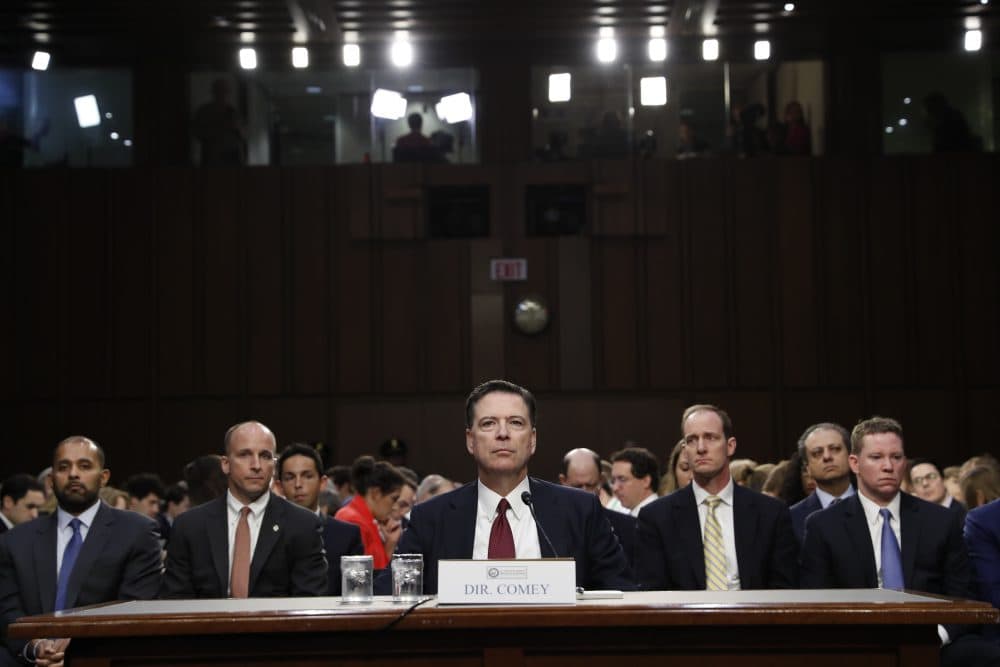 Former FBI Director James Comey listens to the committee chairman at the beginning of the Senate Intelligence Committee hearing on Capitol Hill, Thursday, June 8, 2017, in Washington. (Alex Brandon/AP)