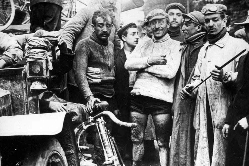 Encrusted with dirt, Maurice Garin smiles at a stage finish. Rival Léon Georget (left) appears completely spent. (Spaarnestad Photo)