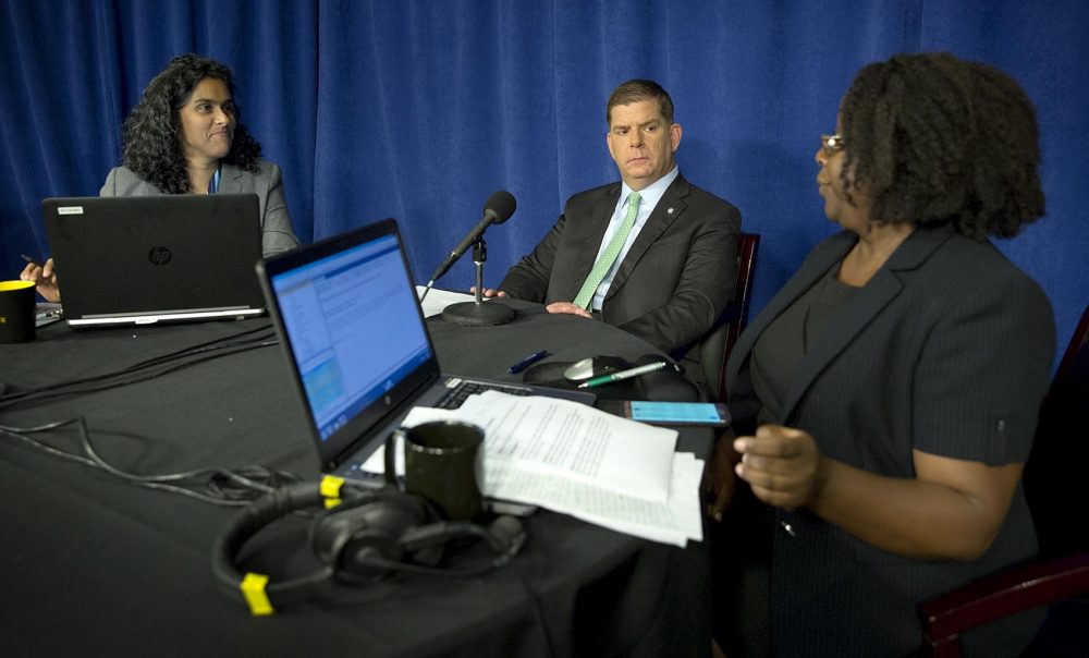 Mayor Marty Walsh at a conversation about the Boston mayoral race. He took questions from Radio Boston's Meghna Chakrabarti, left, and Meghan Irons of the Boston Globe. (Robin Lubbock/WBUR)