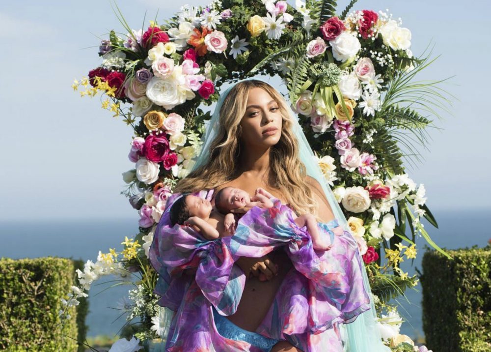In this undated image released by Parkwood Entertainment on Friday, July 14, 2017, Beyonce posed with her newborn twins Sir Carter and Rumi. The singer posted the picture on Instagram late Thursday night and wrote in the caption, "Sir Carter and Rumi 1 month today." She didn't mention the babies' genders, but Beyonce's mother wrote on Instagram that the pop star had given birth to a boy and a girl. (Mason Poole/Parkwood Entertainment via AP)