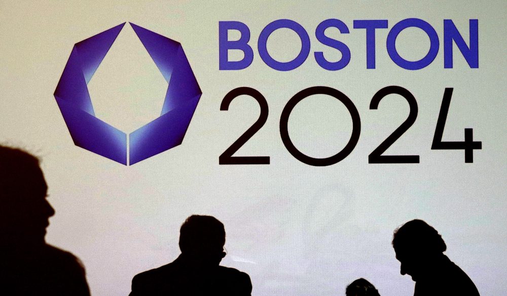 In this Jan. 21, 2015, file photo, organizers and reporters wait for a news conference by organizers of Boston's campaign for the 2024 Summer Olympics in Boston. To great fanfare, the U.S. Olympic Committee chose Boston as its bid city for the 2024 games, only to see local support collapse in spectacular fashion within months amid spirited opposition from opponents resisting any use of taxpayer money to help defray the costs. (Charles Krupa/ AP)