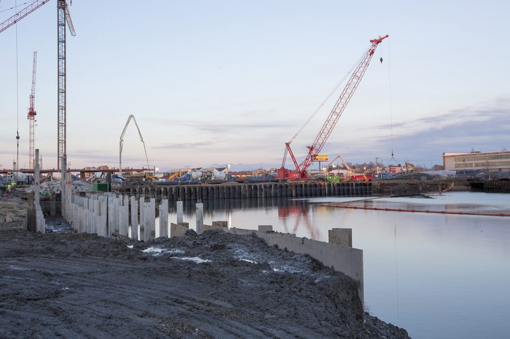 In this January file photo, construction is under way on the Wynn Boston Harbor casino on the shoreline of the Mystic River. (Jesse Costa/WBUR)