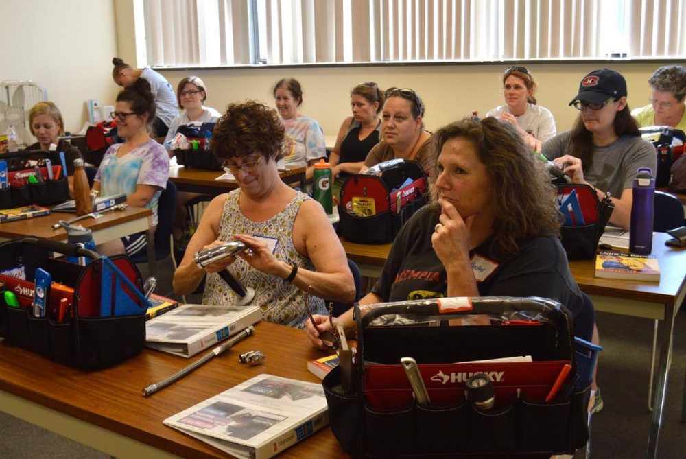 Women attend the second of five classes on home repair sponsored by NeighborWorks of Western Vermont. The course, which is taught by Morgan Overable, is geared especially for women. (Nina Keck/Vermont Public Radio)