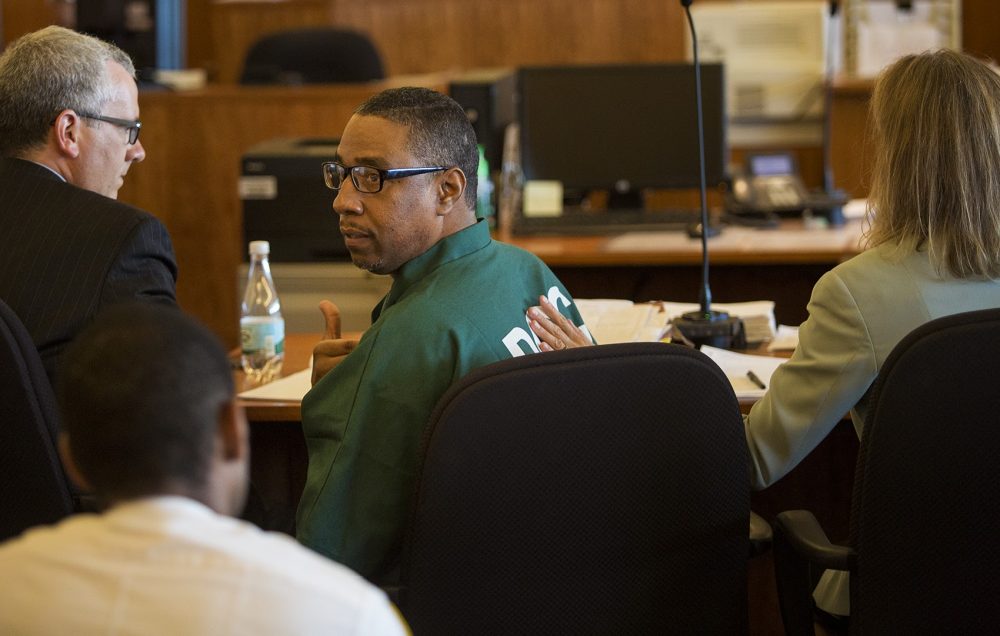 At his latest hearing at Bristol County Courthouse in Fall River.on Tuesday, Darrell Jones turns to his mother in the courtroom and tells her, &quot;I'm OK.&quot; (Jesse Costa/WBUR)