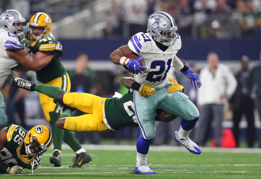 Ezekiel Elliott of the Dallas Cowboys carries the ball during the fourth quarter against the Green Bay Packers in the NFC Divisional Playoff game at AT&T Stadium on Jan. 15, 2017 in Arlington, Texas. (Tom Pennington/Getty Images)
