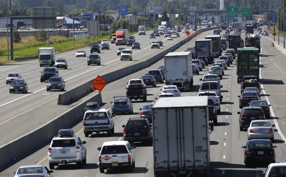 Truck and automobile traffic mix on Interstate 5, headed north through Fife, Wash., near the Port of Tacoma in 2016. (Ted S. Warren/AP)