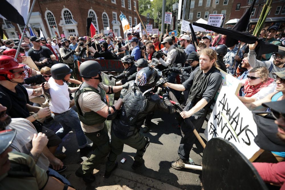 White nationalists, neo-Nazis and members of the "alt-right" clash with counter-protesters as they enter Emancipation Park during the "Unite the Right" rally on Aug. 12, 2017 in Charlottesville, Va. (Chip Somodevilla/Getty Images)