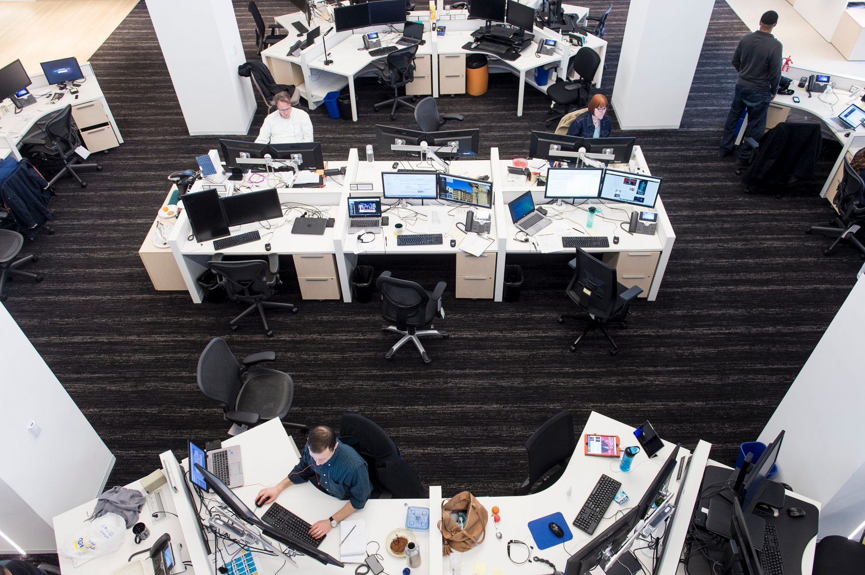 At the headquarters of the Washington Post, one journalist is using artificial intelligence to write the news. Pictured: The Post's newsroom in Washington, D.C. (Brendan Smialowski/AFP/Getty Images)