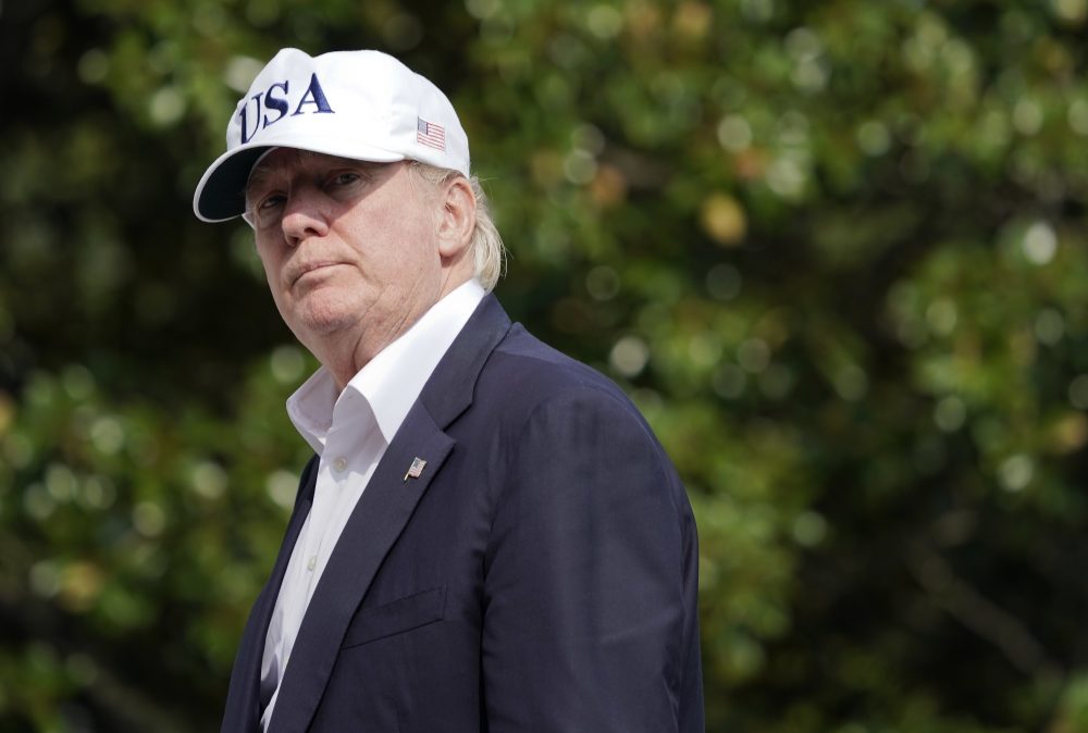 President Trump walks across the South Lawn of the White House in Washington on Sunday following his return after spending the weekend at nearby Camp David, Md., (Pablo Martinez Monsivais/AP)