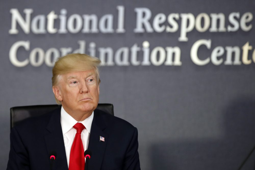 President Donald Trump meets with emergency officials to discuss the hurricane season, Friday, Aug. 4, 2017, at Federal Emergency Management Agency (FEMA) headquarters in Washington. (Jacquelyn Martin/AP)