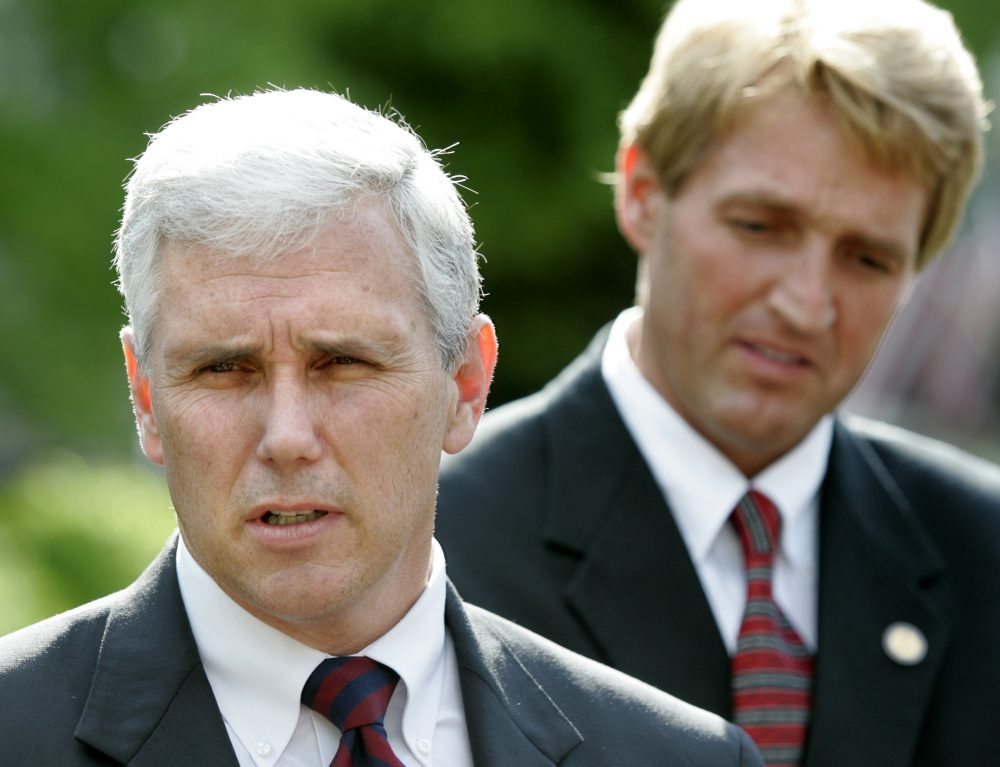Representatives Mike Pence, R-Ind. and Jeff Flake, R-Ariz. speak with reporters outside the White House after meeting with President Bush, Wednesday, April 27, 2005, in Washington. (Lawrence Jackson/AP)