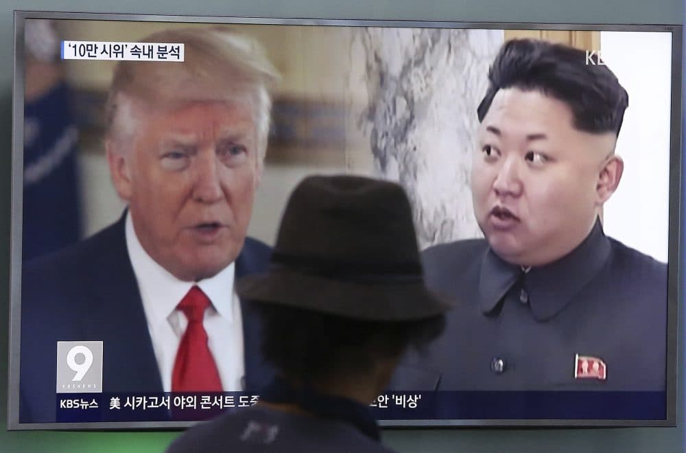 A man watches a television screen showing President Donald Trump and North Korean leader Kim Jong Un during a news program at the Seoul Train Station in Seoul, South Korea, Thursday, Aug. 10, 2017. President Donald Trump issued a new threat to North Korea on Thursday, demanding that Kim Jong Un's government "get their act together" or face extraordinary trouble. He said his previous "fire and fury" warning to Pyongyang might have been too mild. (Ahn Young-joon/AP)