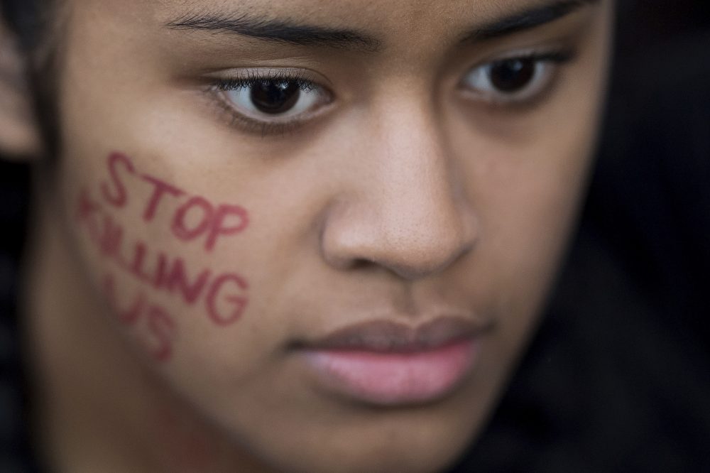 Lucy Siale protests against racism in Oakland, Calif., Saturday, Aug. 12, 2017. A group of several hundred demonstrators gathered to decry racism following deadly violence that erupted at a white nationalist demonstration in Virginia. (Noah Berger/AP)