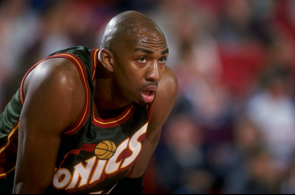 "We came up with a plan. And we exercised that plan, and part of the plan was to make caramel macchiatos and serve coffee at Starbucks," Vin Baker recalls. (Brian Bahr/Allsport/Getty Images)