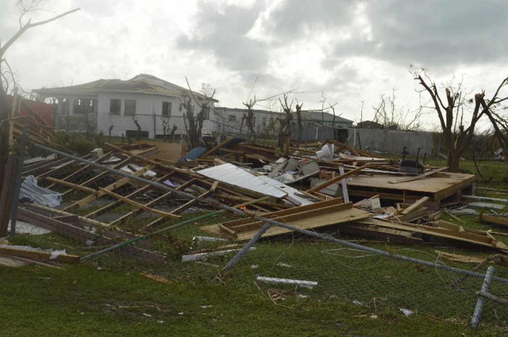 In this Thursday, Sept. 7, 2017, photo, damage is left after Hurricane Irma hit Barbuda. Hurricane Irma battered the Turks and Caicos Islands early Friday as the fearsome Category 5 storm continued a rampage through the Caribbean that has killed a number of people, with Florida in its sights. (Anika E. Kentish/AP)