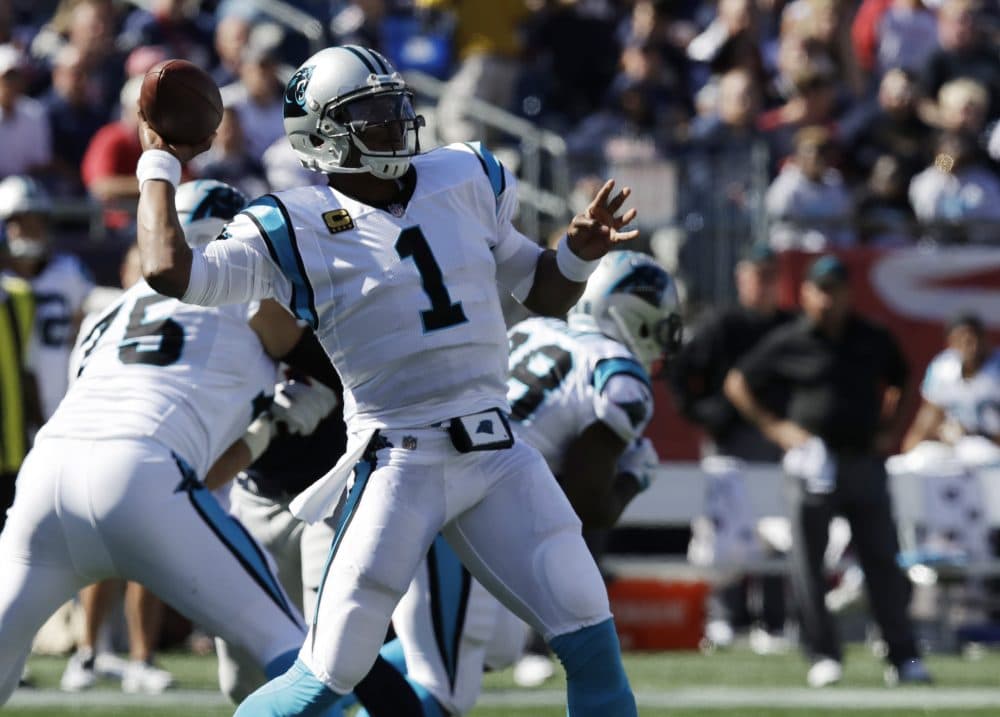 Carolina Panthers quarterback Cam Newton (1) passes during the first half on Sunday in Foxborough, Mass. (Charles Krupa/AP)