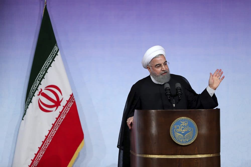 In this photo released by the official website of the office of the Iranian Presidency, Iran's President Hassan Rouhani speaks during a ceremony marking the beginning of new Iranian academic year at the Tehran University, in Tehran, Iran, Saturday, Oct. 7, 2017. Iran's president on Saturday defended the 2015 nuclear deal with world powers, saying not even 10 Donald Trumps can roll back its benefits to his country as President Trump appears to be stepping back from his campaign pledge to rip up the deal, instead aiming to take other measures against Iran. (Iranian Presidency Office via AP)