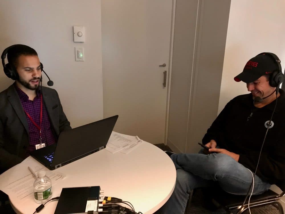 Season Ticket host, Chris Gasper (L), records an episode of the podcast with NFL Reporter Albert Breer (R).