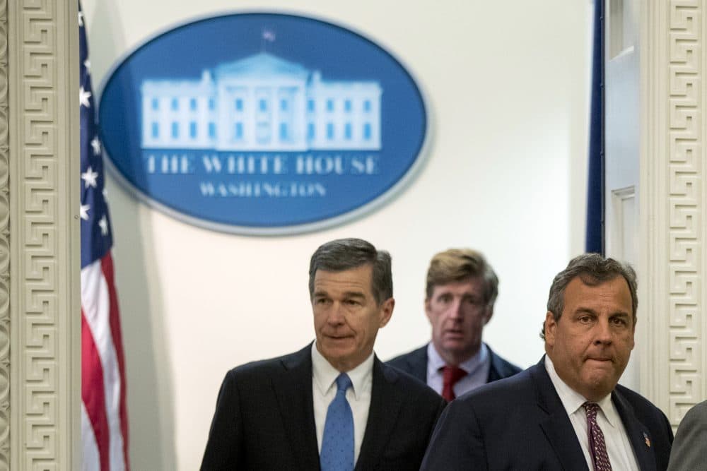 From left, North Carolina Gov. Roy Cooper, former Rep. Patrick Kennedy, R.I., and Chairman, New Jersey Gov. Chris Christie arrive for a President's Commission on Combating Drug Addiction and the Opioid Crisis meeting in the Eisenhower Executive Office Building on the White House Complex, Wednesday, Sept. 27, 2017, in Washington. (Andrew Harnik/AP)
