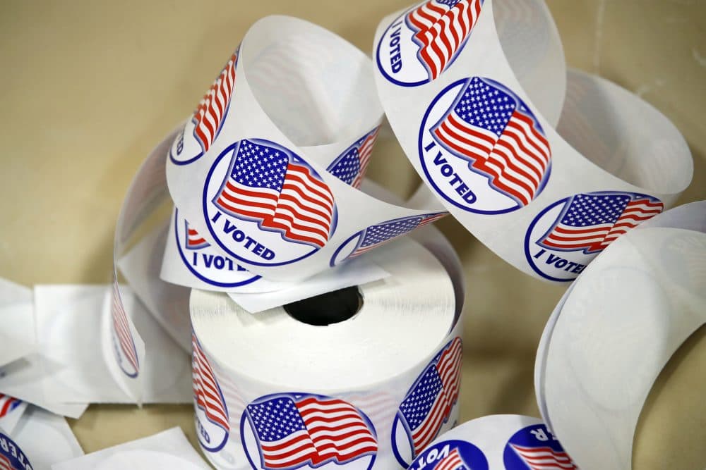 "I Voted" stickers are seen at a polling place Nov. 7. (Alex Brandon/AP)