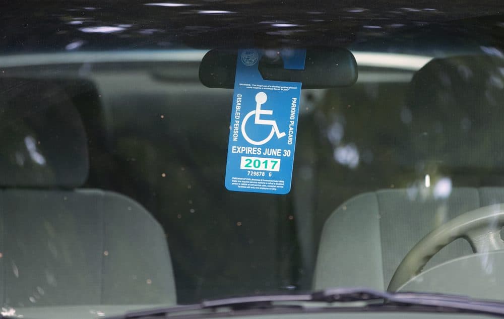 A handicapped placard hangs in a vehicle parked by the Capitol Tuesday, April 18, 2017, in Sacramento, Calif. (Rich Pedroncelli/AP)