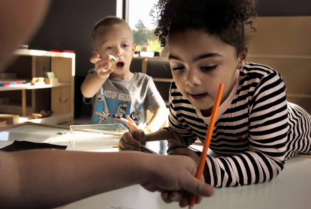 In this Oct. 12, 2017, photo children in a combined pre-kindergarten and kindergarten Wampanoag language immersion class work on their lessons at the Wampanoag Tribe Community and Government Center, in Mashpee, Mass. A dozen or so adults and dozens of youngsters have gained at least some proficiency in their ancestors' tongue, which vanished as more colonists arrived and displaced the native people from their homelands in what's now Massachusetts and Rhode Island. (Steven Senne/AP)