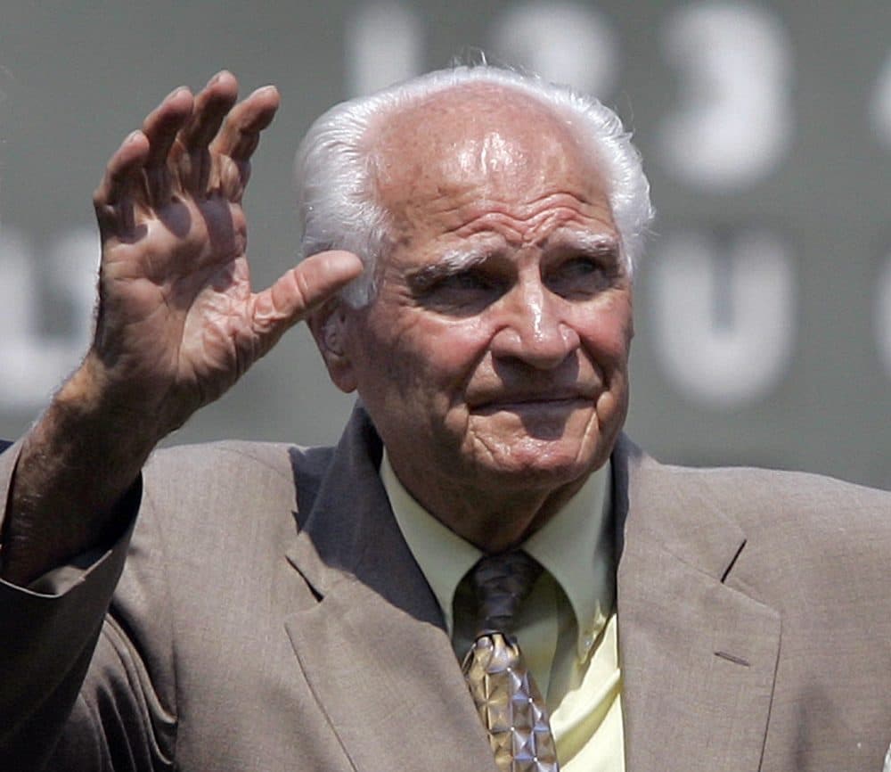 In this Aug. 2, 2007, file photo, Boston Red Sox Hall of Famer Bobby Doerr waves to the crowd at Fenway Park in Boston, prior to a baseball game between the Red Sox and the Baltimore Orioles. Doerr, a Hall of Fame second baseman who was dubbed the "silent captain" by longtime Red Sox teammate and life-long friend Ted Williams, has died. He was 99. (Elise Amendola/AP)
