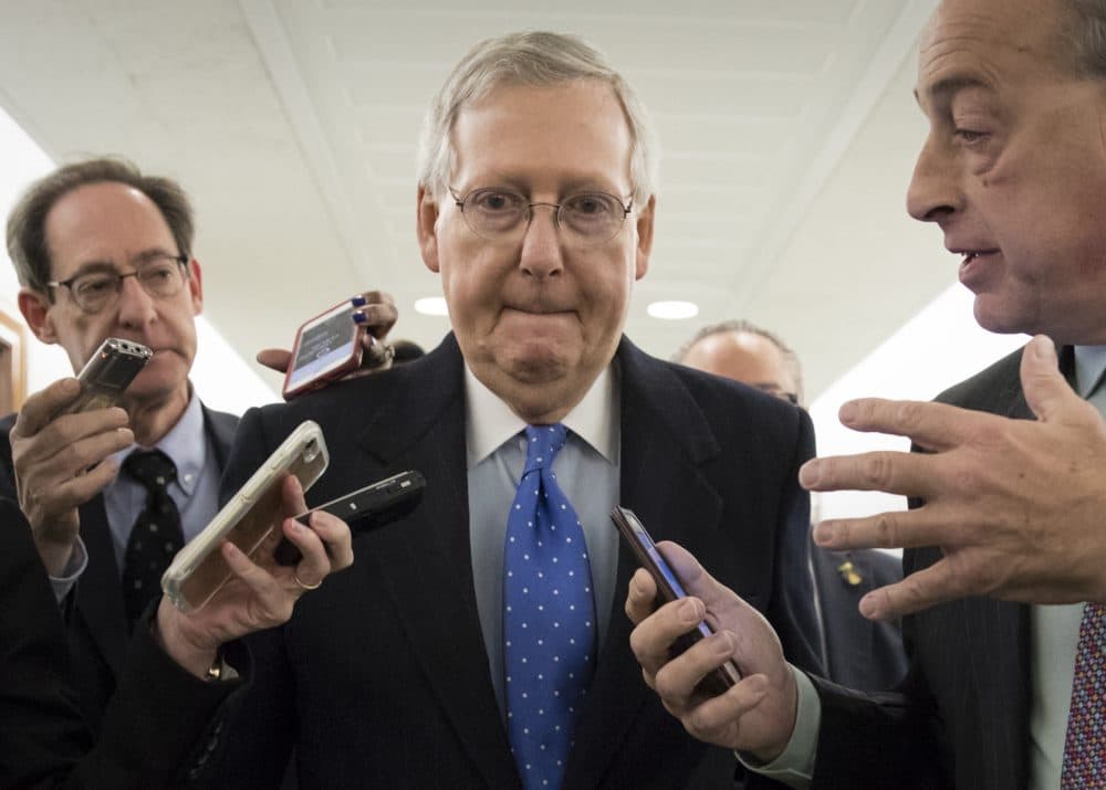 Senate Majority Leader Mitch McConnell, R-Ky., is surrounded by reporters as Republicans work to pass their sweeping tax bill, on Capitol Hill in Washington, Thursday, Nov. 30, 2017. (J. Scott Applewhite/AP)
