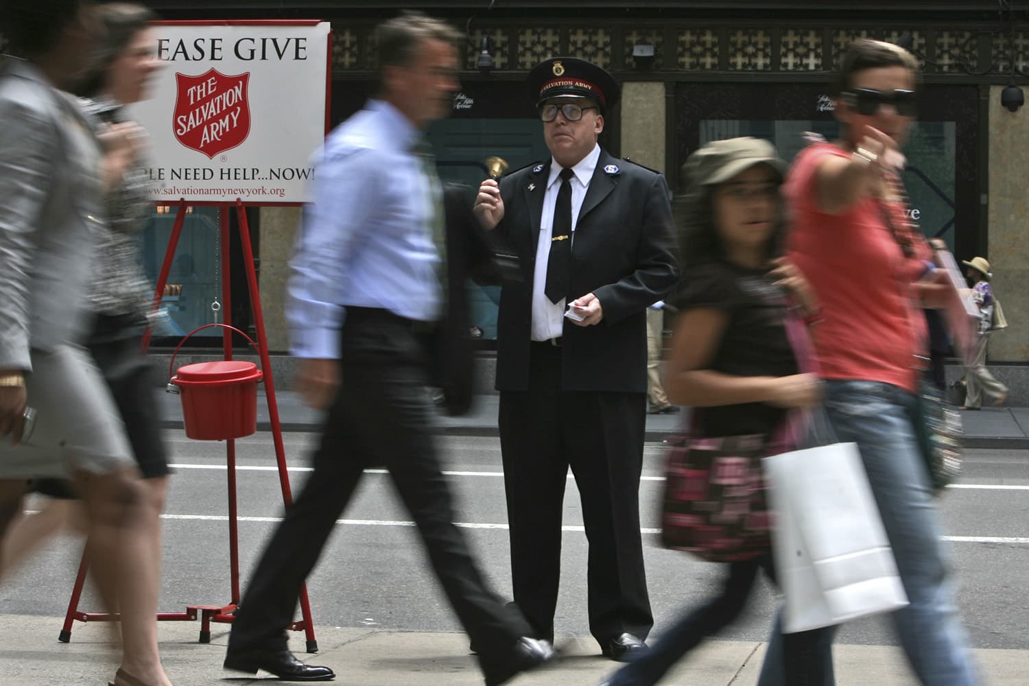 Salvation Army Soldier Daniel Aherns collects donations on 5th Ave. at Rockefeller Center, Monday, July 13, 2009 in New York.
