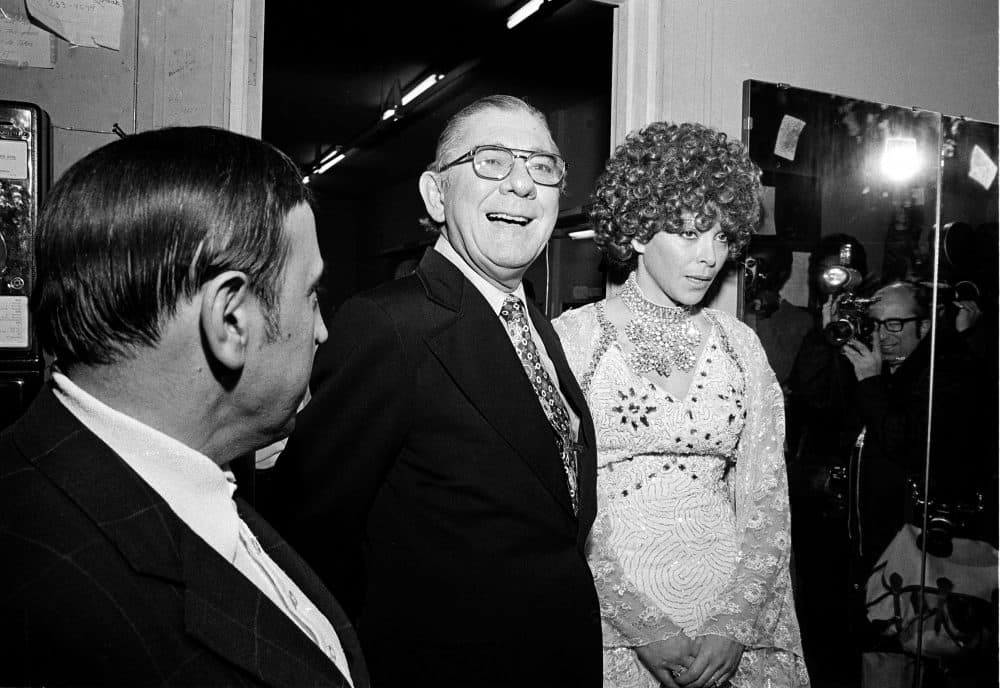 Rep. Wilbur D. Mills (D-Ark.), stands with exotic dancer Fanne Foxe, also known as "The Washington Tidal Basin Bombshell," after one of her late-night performances in Boston on Dec. 2, 1974. (AP Photo)