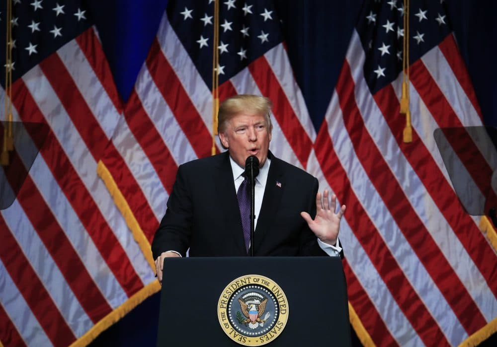 President Donald Trump speaks and lays out a national security strategy that envisions nations in perpetual competition, reverses Obama-era warnings on climate change, and de-emphasizes multinational agreements, in Washington, Monday, Dec. 18, 2017. (Manuel Balce Ceneta/AP)