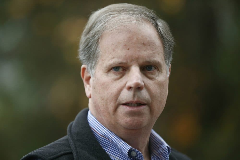 FILE- In this Dec. 4, 2017 file photo, Democratic senatorial candidate Doug Jones speaks at a news conference, in Dolomite, Ala. In Alabamas special Senate election, underdog Jones and his fellow Democrats are intent on not sinking his upset bid against Republican Roy Moore. (AP Photo/Brynn Anderson, File)