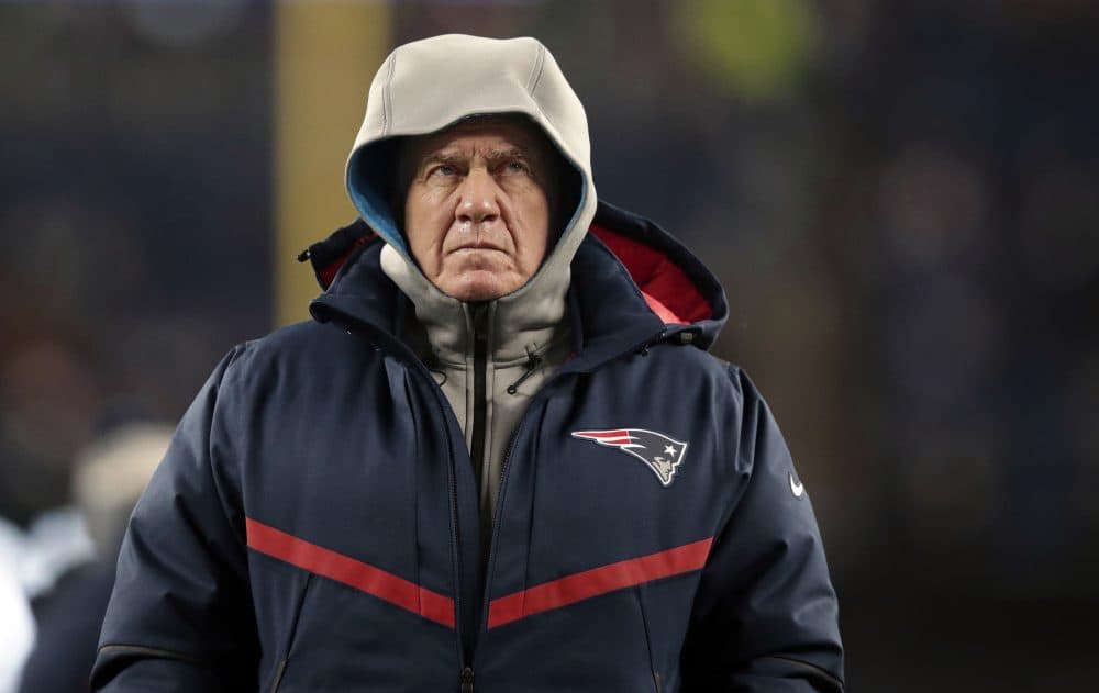 New England Patriots head coach Bill Belichick walks on the field before an NFL divisional playoff football game against the Tennessee Titans on Saturday in Foxborough, Mass. (Charles Krupa/AP)