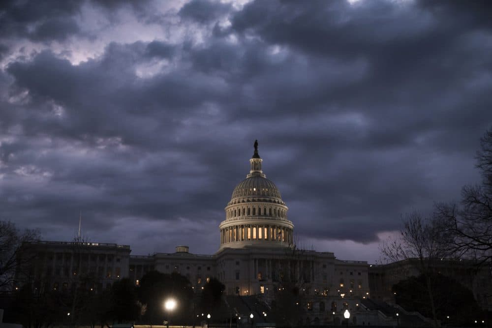 Lights shine inside the U.S. Capitol Building as day three of a partial government shutdown starts on Capitol Hill in Washington, Monday, Jan. 22, 2018. (J. Scott Applewhite/AP)