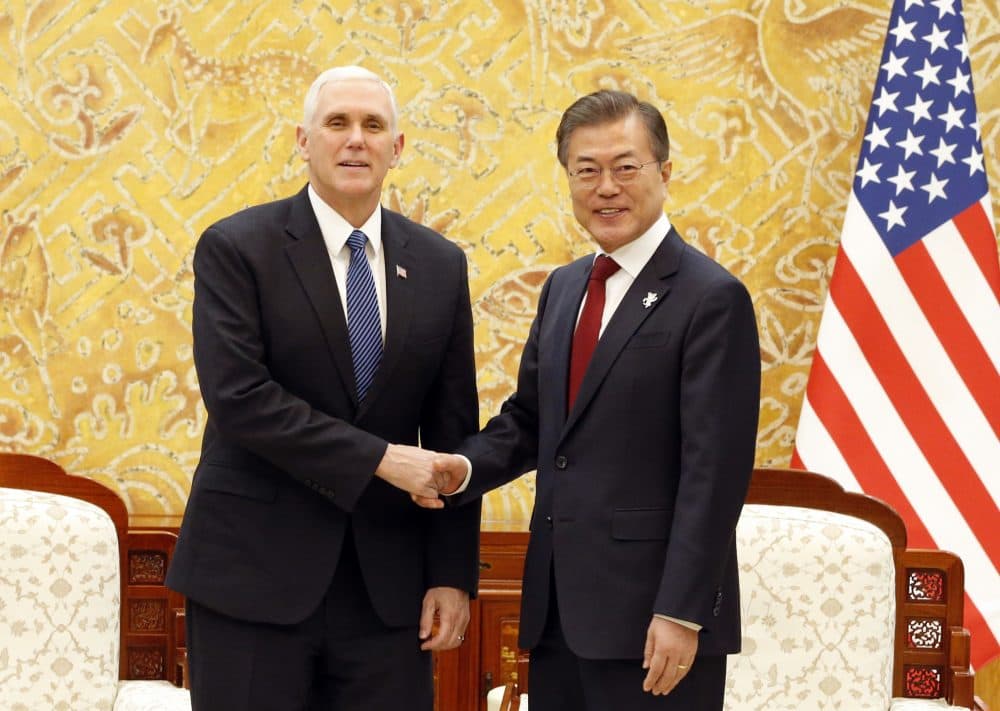 Vice President Mike Pence, left, shakes hands with South Korean President Moon Jae-in prior to their meeting at the presidential office Blue House in Seoul Thursday, Feb. 8, 2018. (Kim Hee-chul/Pool Photo via AP)