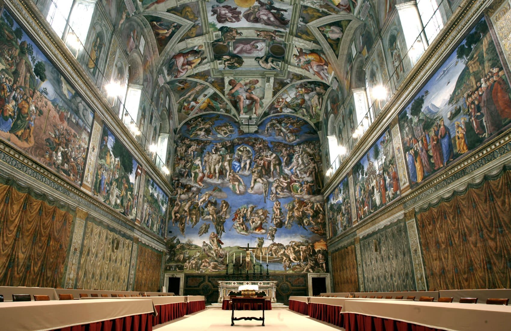 Five centuries after Michelangelo's ceiling frescoes were inaugurated at the Sistine Chapel, at least 10,000 people visit the site each day. (Pier Paolo Cito/AP)
