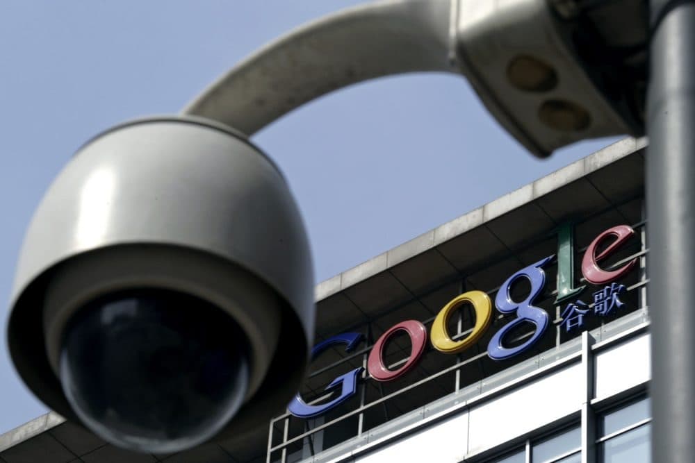 In this March 23, 2010 file photo, a surveillance camera is seen in front of the Google China headquarters in Beijing, China. (AP Photo/Andy Wong, File)