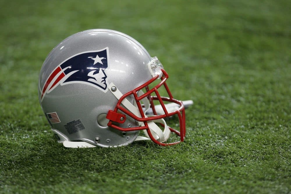 According to the Boston Globe, more than 340 "former Patriots or their estates" have sued the NFL and the helmet maker Riddell. (Streeter Lecka/Getty Images)
