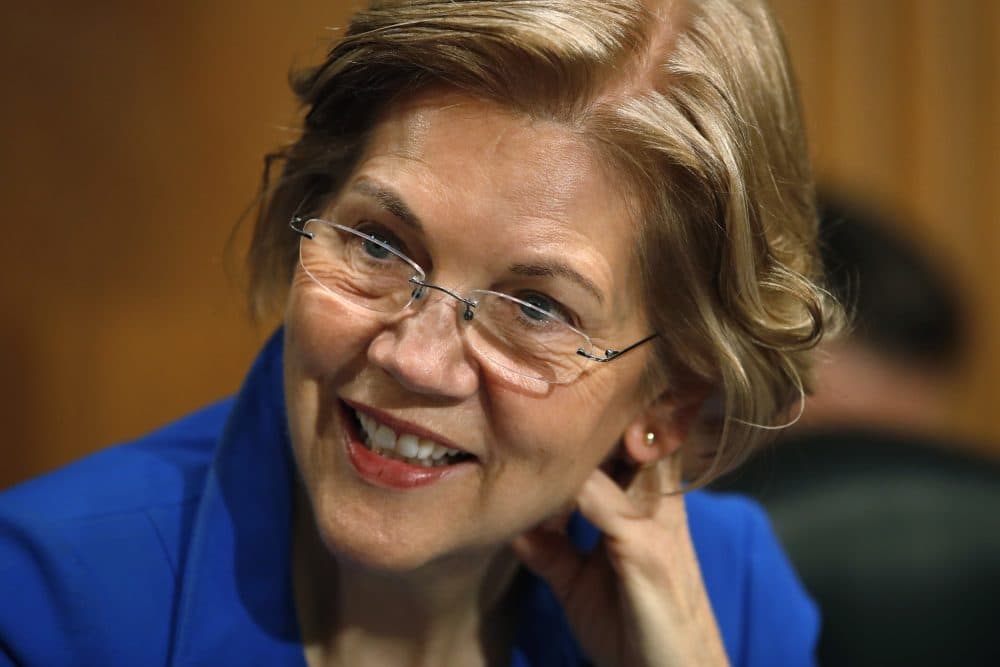 Sen. Elizabeth Warren, D-Mass., arrives for a Senate Banking Committee hearing on the nomination of Marvin Goodfriend to be a member of the Federal Reserve Board of Governors on Jan. 23 on Capitol Hill in Washington. (Jacquelyn Martin/AP)