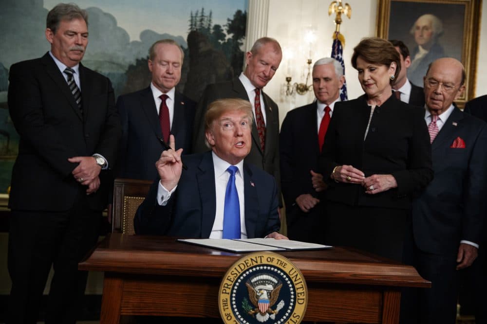 President Trump speaks before he signs a presidential memorandum imposing tariffs on China in the Diplomatic Reception Room of the White House Thursday in Washington. (Evan Vucci/AP)