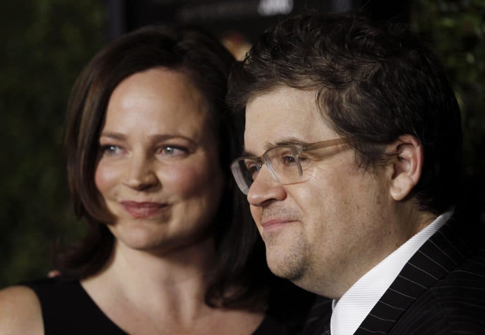 Patton Oswalt, right, and Michelle Eileen McNamara arrive at the premiere of "Young Adult" in Beverly Hills, Calif., Thursday, Dec. 15, 2011. (Matt Sayles/AP)