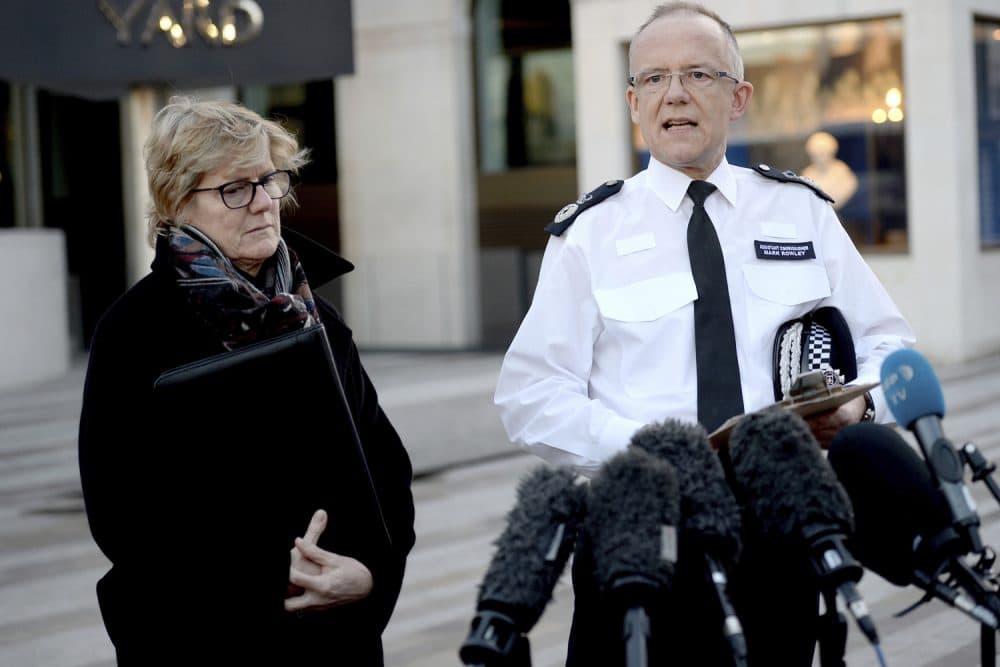 Head of counter-terrorism policing Assistant Commissioner Mark Rowley, right, and England's chief medical officer Dame Sally Davies giving an update Wednesday March 7, 2018, on the ongoing incident after former Russian double agent Sergei Skripal and his daughter, Yulia, were found critically ill. (Kirsty O'Connor/PA via AP)