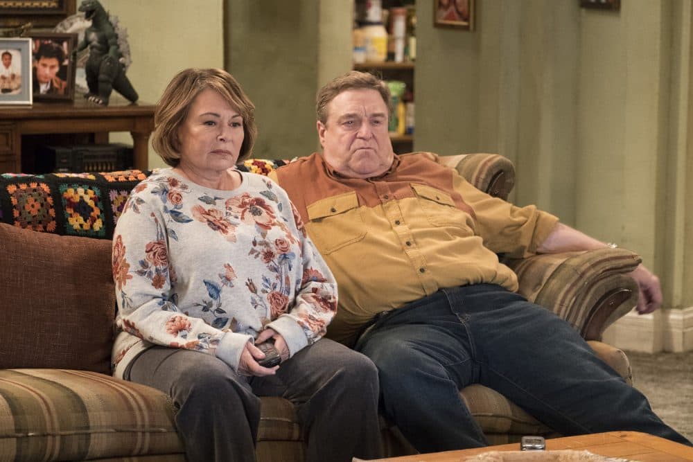 FILE - In this image released by ABC, Roseanne Barr, left, and John Goodman appear in a scene from the reboot of "Roseanne," premiering on Tuesday at 8 p.m. EST. (Adam Rose/ABC via AP, File)