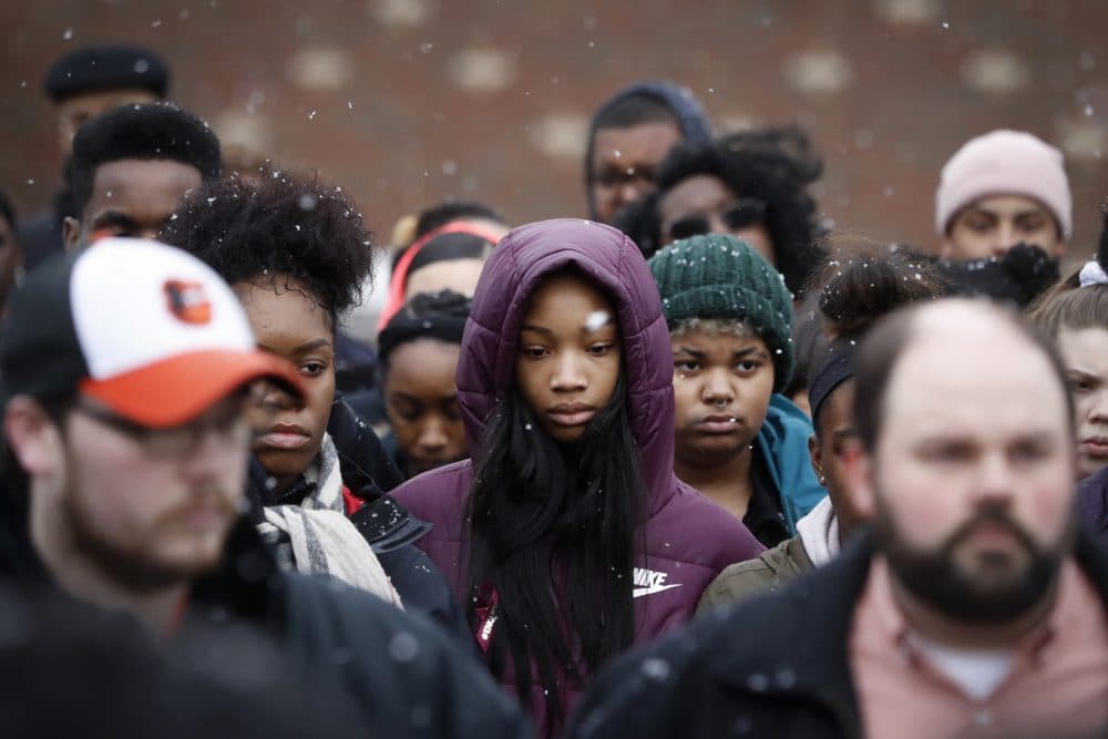 Students gather on their soccer field during a 17-minute walkout protest at the Stivers School for the Arts in Dayton, Ohio on Wednesday, March 14, 2018. Students across the country participated in walkouts Wednesday to protest gun violence, one month after the deadly shooting inside a high school in Parkland, Fla. (AP Photo/John Minchillo)