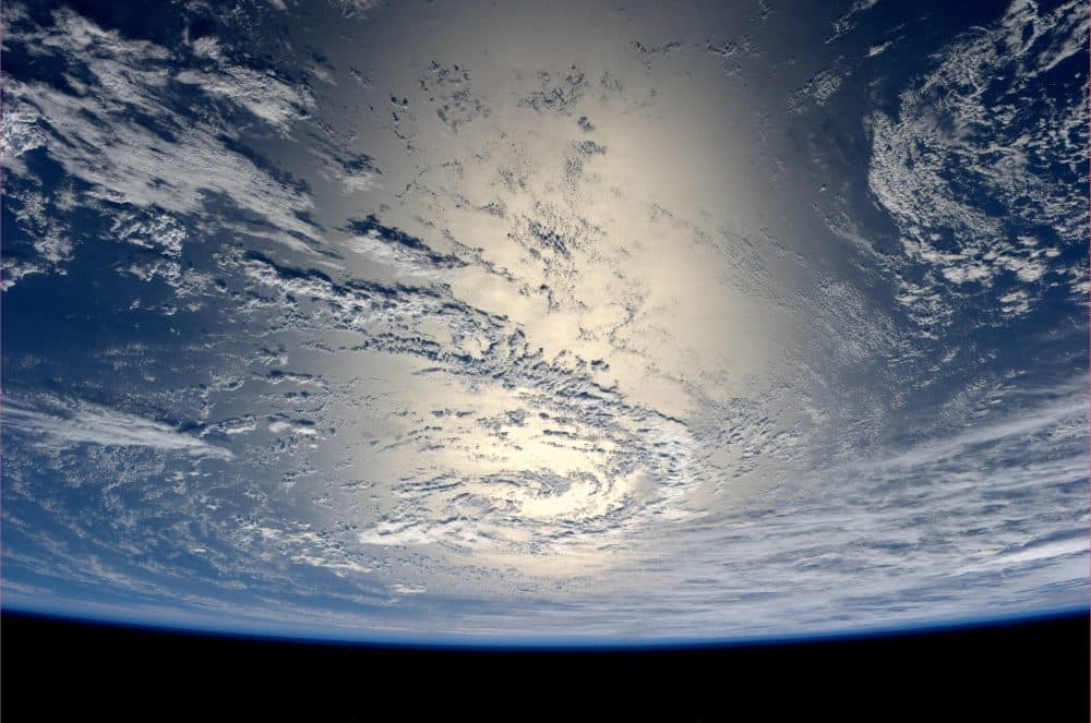 In this handout photo provided by the European Space Agency (ESA) on July 17, 2014, the Earth reflects light from the sun. (Alexander Gerst/ESA via Getty Images)