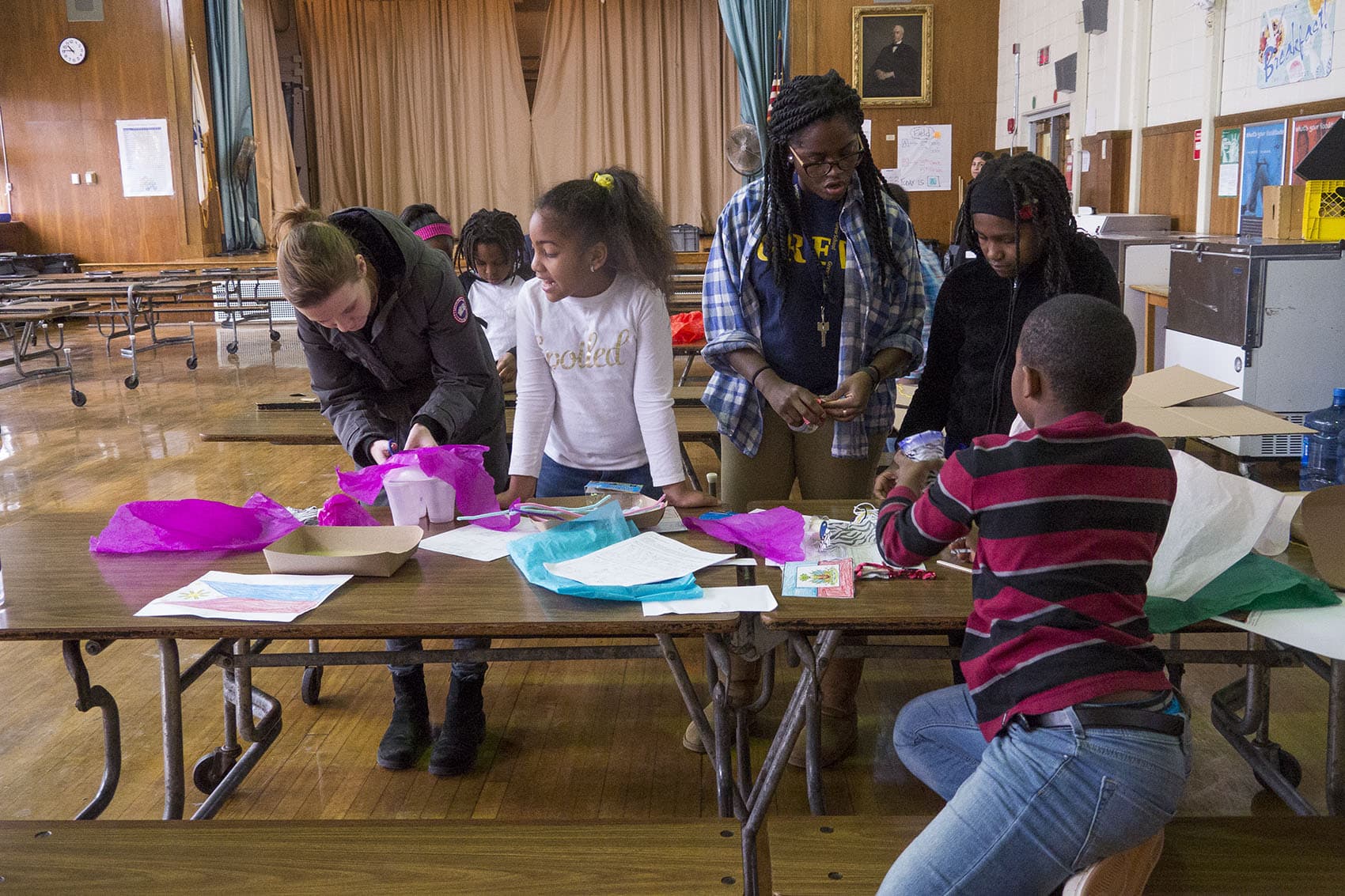 Teacher Natasha Gordon works with students during the Grew Elementary "acceleration academy." (Max Larkin/WBUR)
