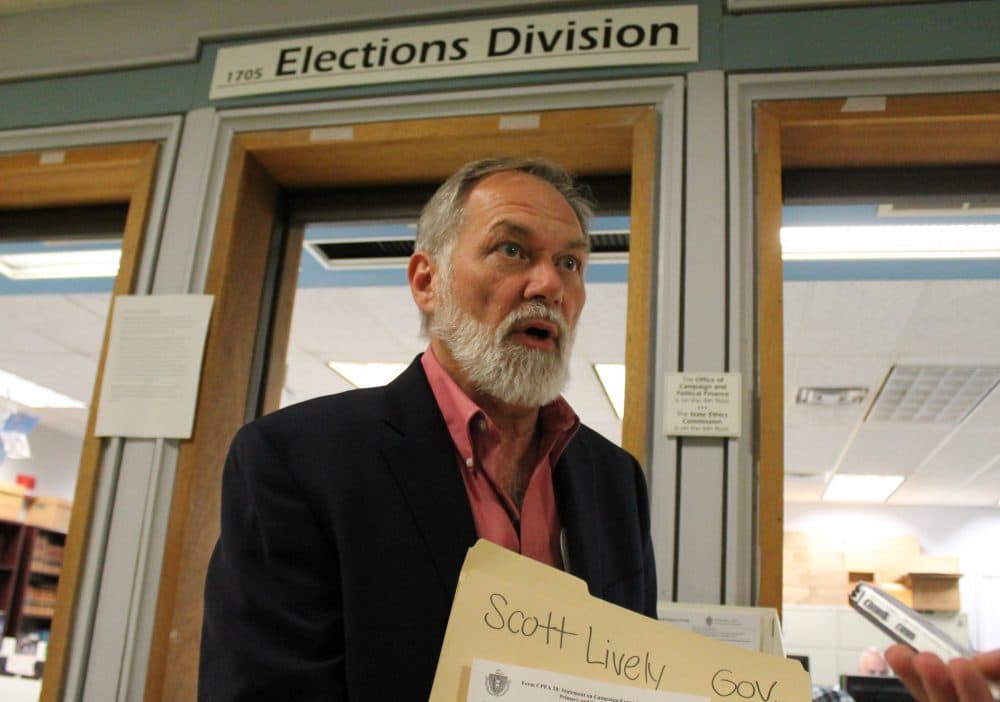 After turning in some of his ballot signatures Tuesday afternoon, pastor Scott Lively called on his primary opponent Gov. Charlie Baker to "come on out, come out of hiding" and debate. (Sam Doran/SHNS)